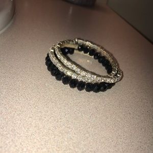 Spiral bracelet with silver and black studs